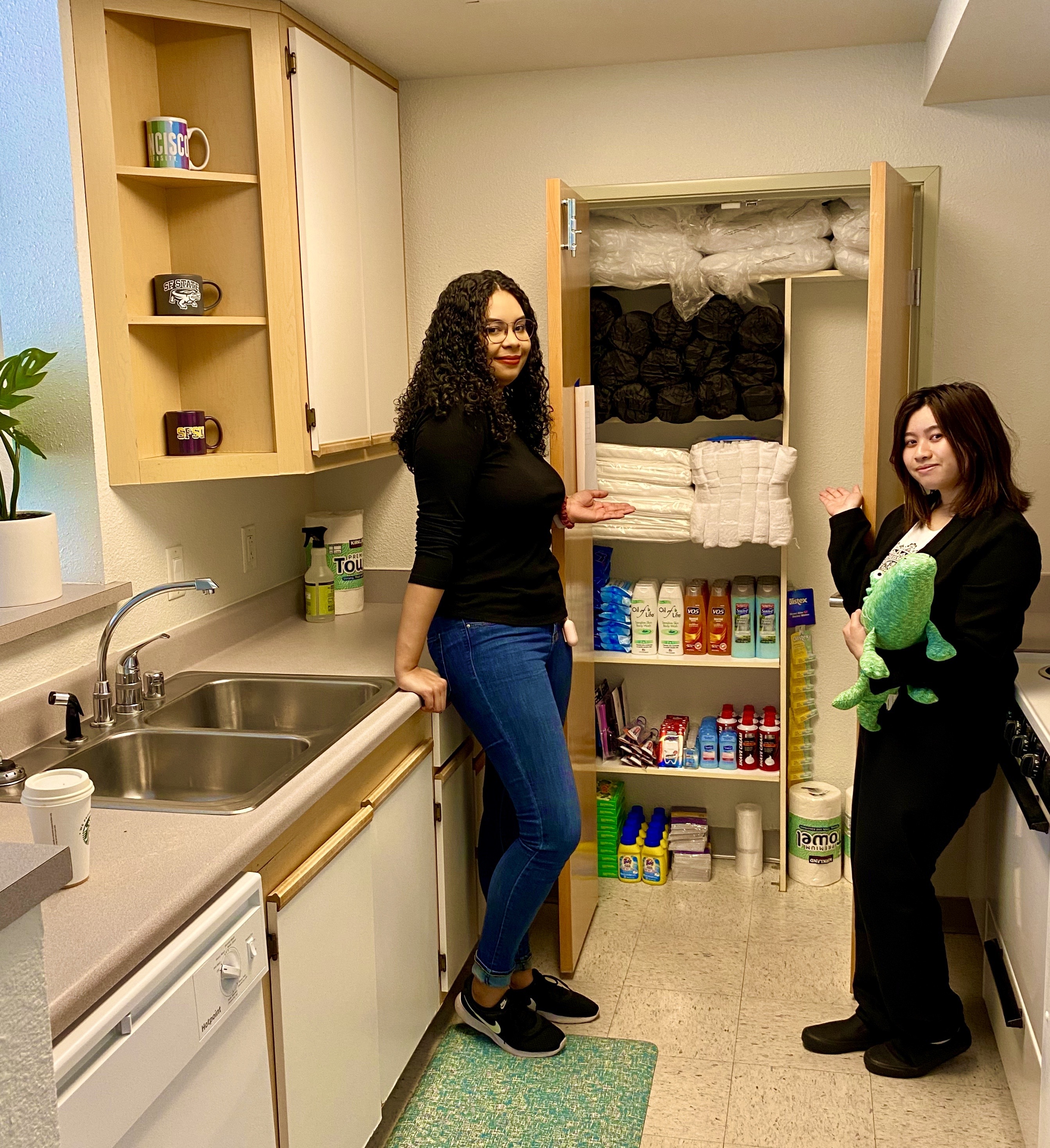 Two students standing in a Gator Crisis Housing unit