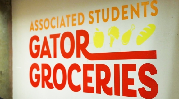 Sign for the Gator Groceries location
